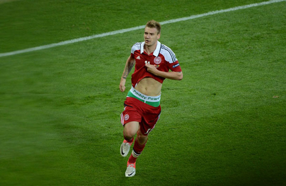 Nicklas Bendtner revealing the infamous Paddy Power lucky pants at the 2012 World Cup